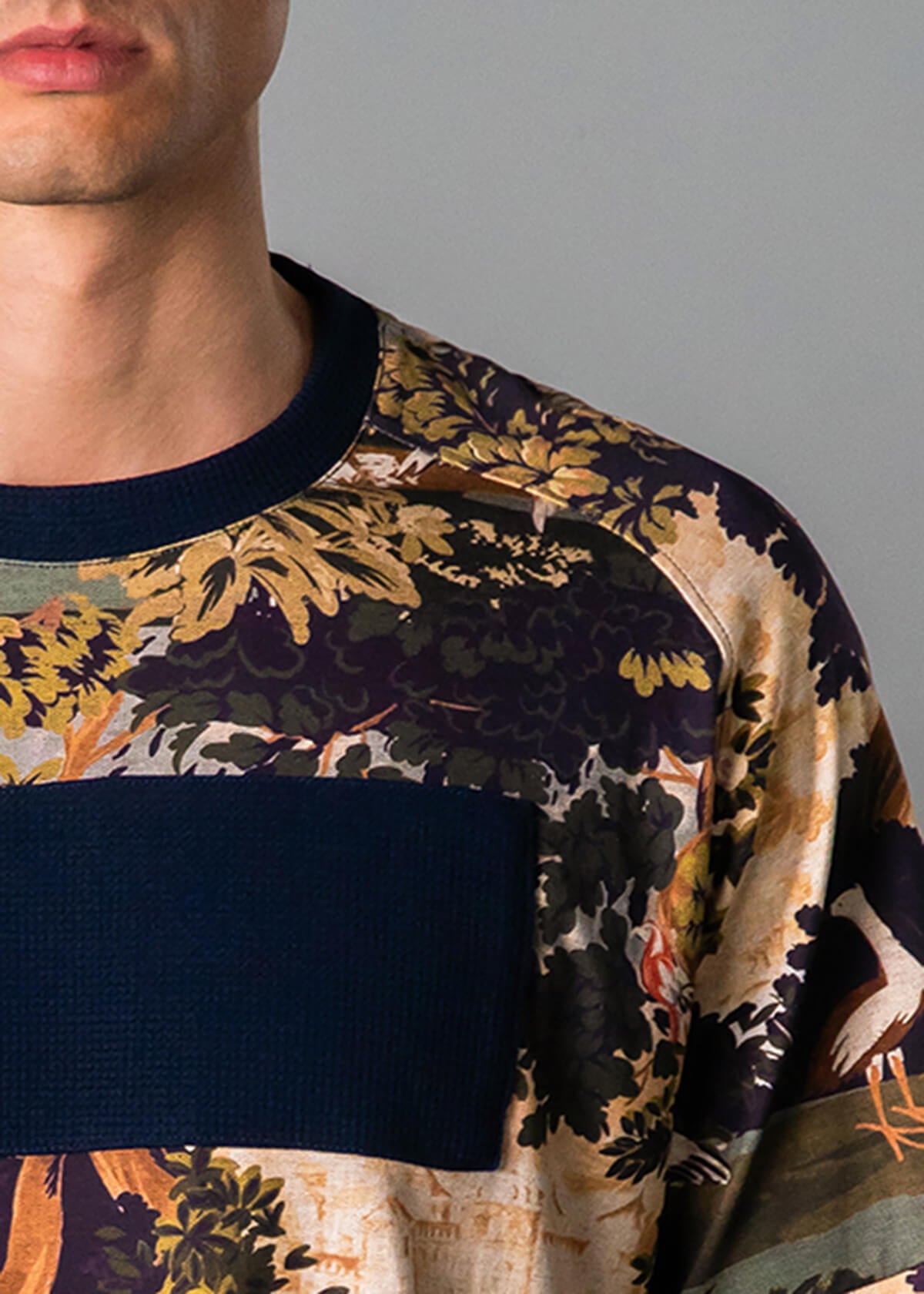 Men’s vacation tee shirt with bold tropical print – Resortwear fashion capturing the White Lotus effect