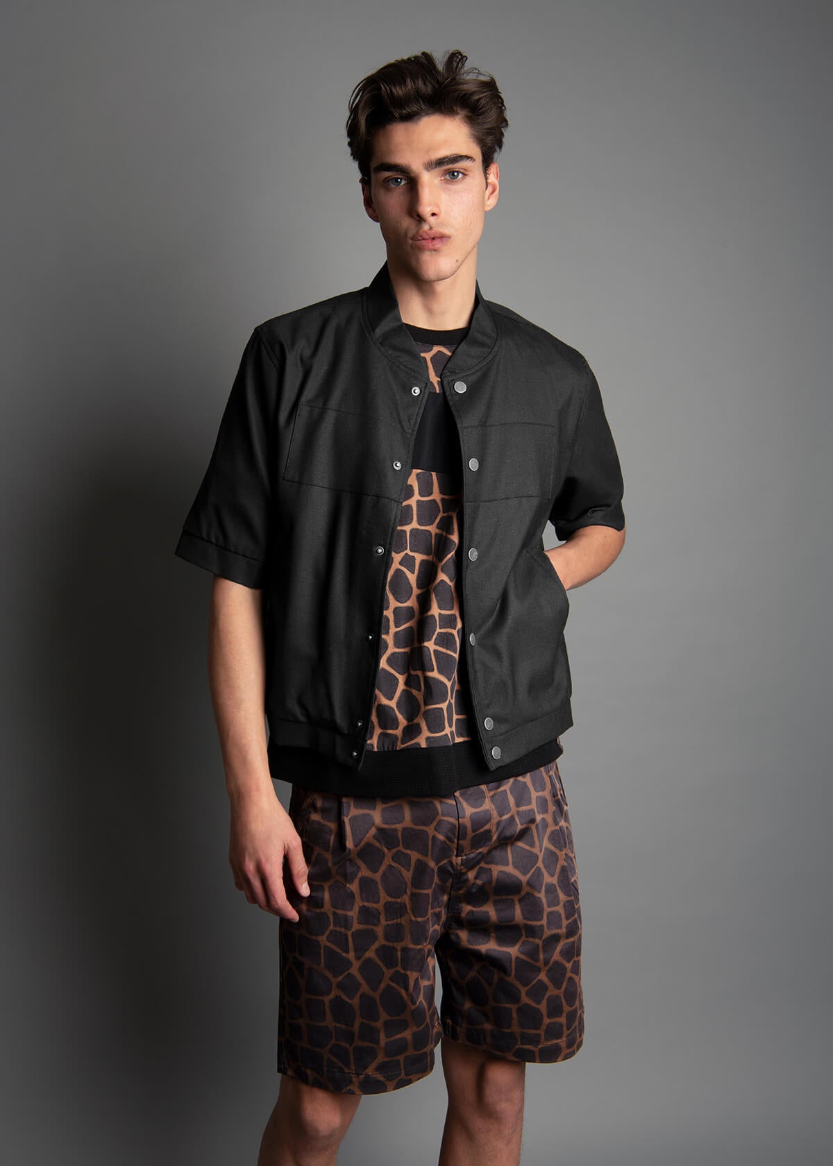 relaxed fit mens short with a black and bronze animal print