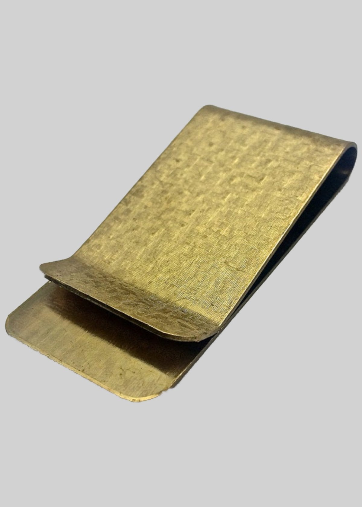vintage style money clip in a gold tone