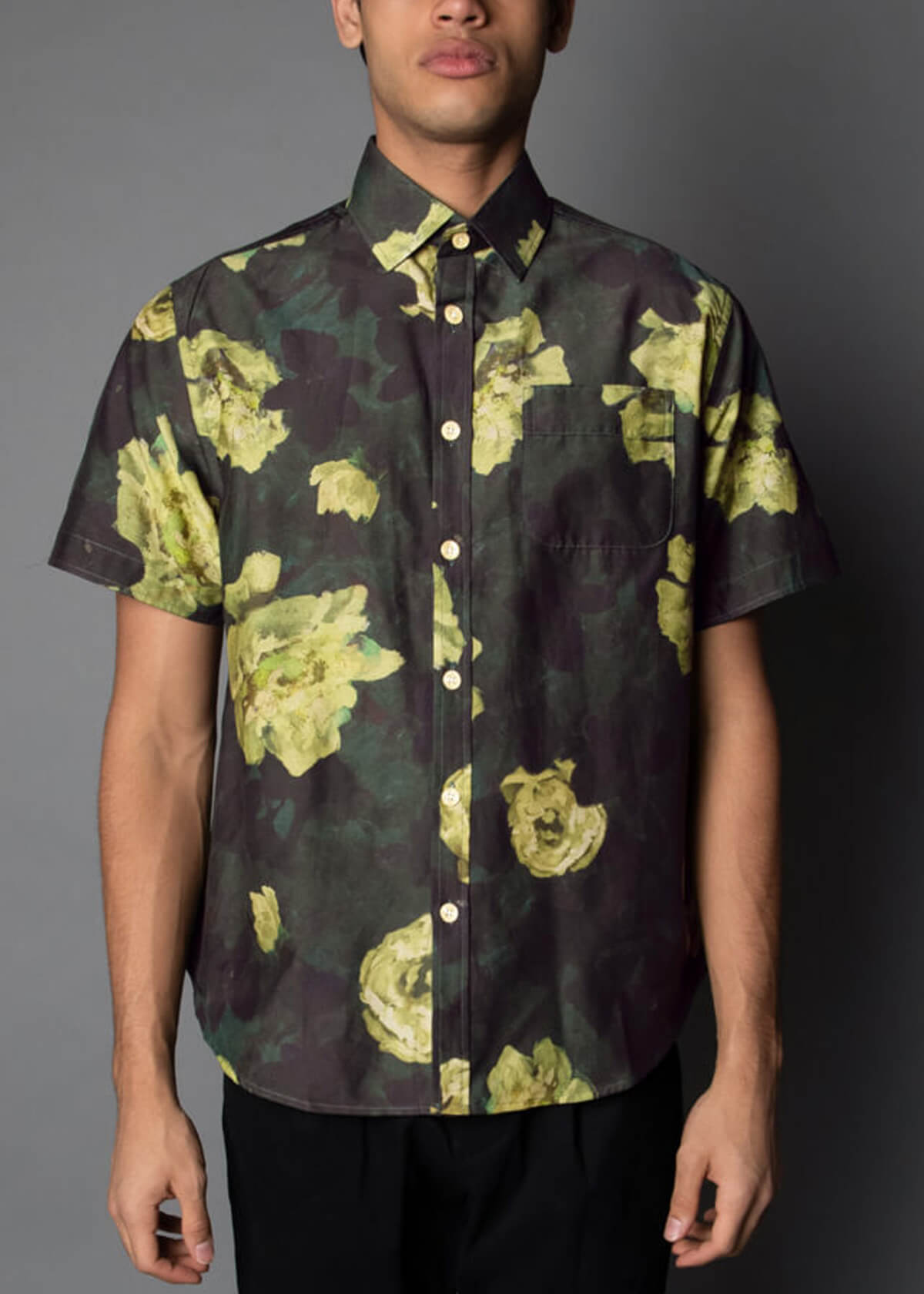 green toned short sleeve mens shirt with a flower print